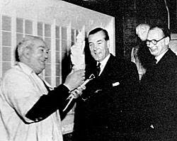 Woodford examining scale models of the 'Queens' Beasts' (photograph courtesy of James Woodford).